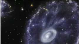 韦伯望远镜拍摄的车轮星系-系中系！仔细会看到其中有两个小的星系正在碰撞融合！我们的银河系也将在40亿年后和仙女座星系大碰撞并融合！#宇宙 #视觉震撼 #地球 #星系碰撞 #探索宇宙