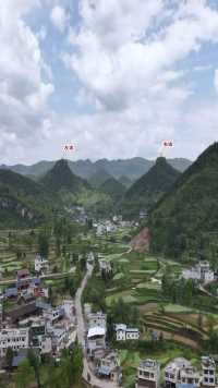神奇的贵州双突山峰，大自然的鬼斧神工，高耸挺拔雄伟壮观，山下还住了上百户人家！