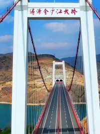 涛源金沙江大桥，横跨于丽江永胜山峦间，如巨龙般卧于碧绿的江水上#最美的风景在路上